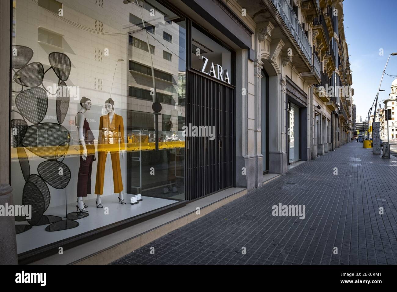 A closed Zara clothing chain store seen on an empty Pelayo street during  the coronavirus crisis.Barcelona faces the 42nd day of confinement and  social distancing. Only authorized establishments are open to the public.  The streets remain empty without ...