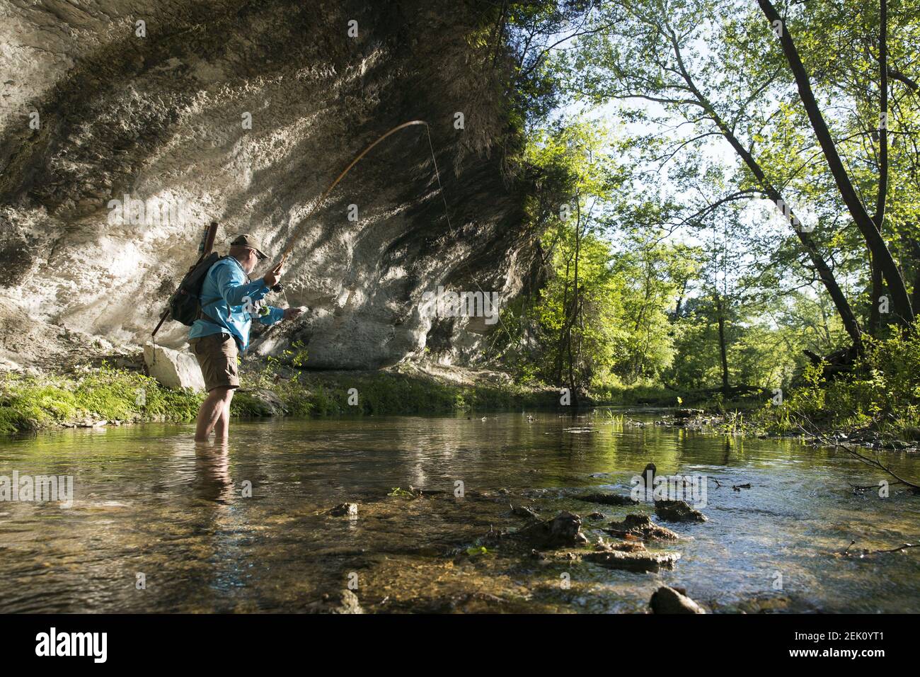 Apr 24, 2020; Georgetown, TX, USA; Aaron Reed, author of Fly Fishing Austin & Central Texas guide book fly fishes the San Gabriel River, one of his home rivers. (Image from photo essay of Texans doing isolated outdoor activities in their own communities.) (Photo by Erich Schlegel/USA Today Network/Sipa USA) Stock Photo