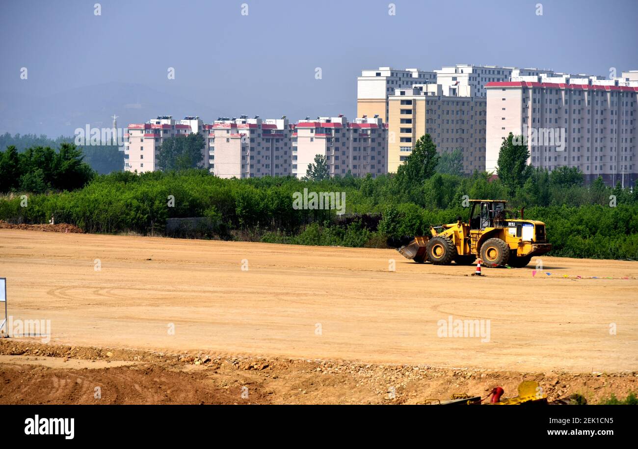 With help of excavators, construction workers build the highspeed