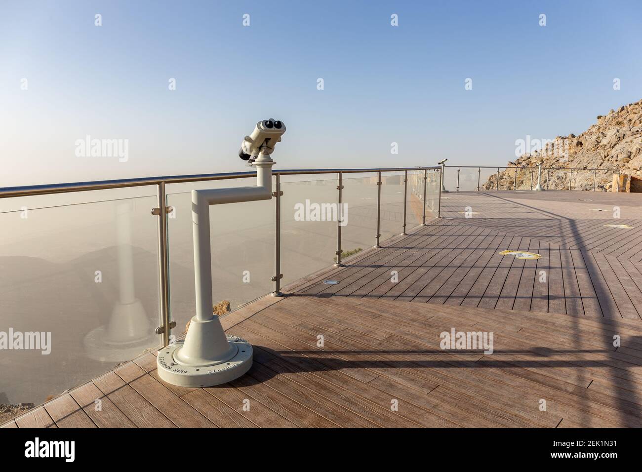 Jebel Jais Viewing Deck Park with coin operated binoculars overlooking Hajar Mountains, UAE. Stock Photo