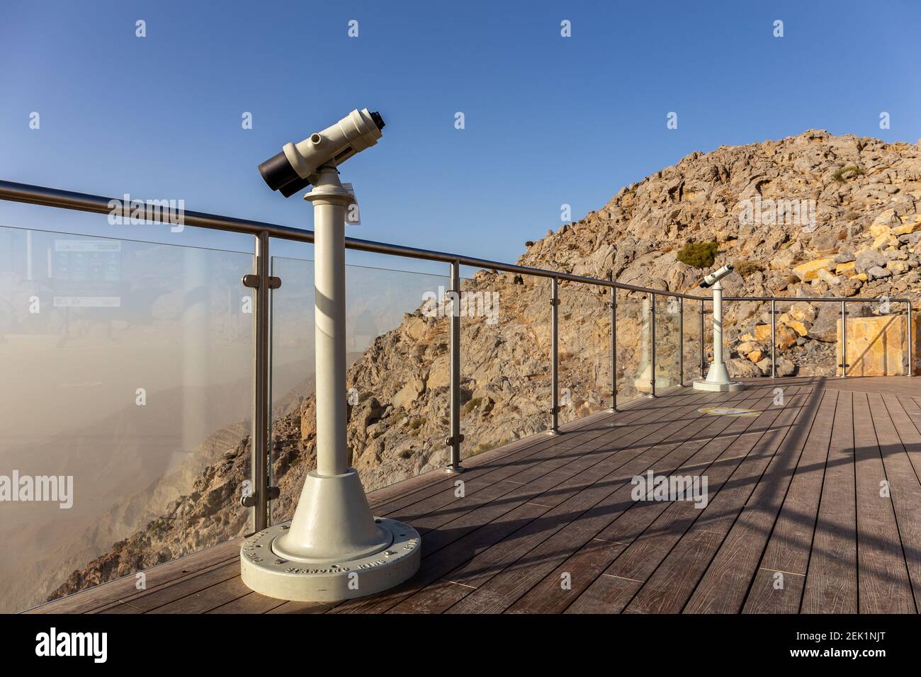 Jebel Jais Viewing Deck Park with coin operated binoculars overlooking Hajar Mountains, UAE. Stock Photo