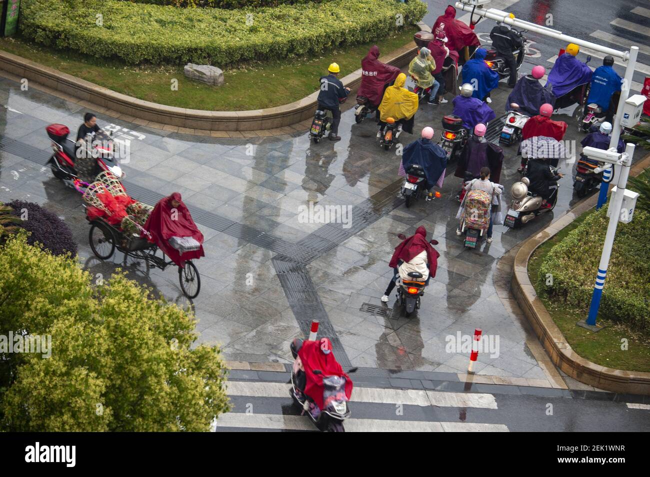 HAI'AN, CHINA MAY 8, 2020 Pedestrians cross a zebra crossing in the