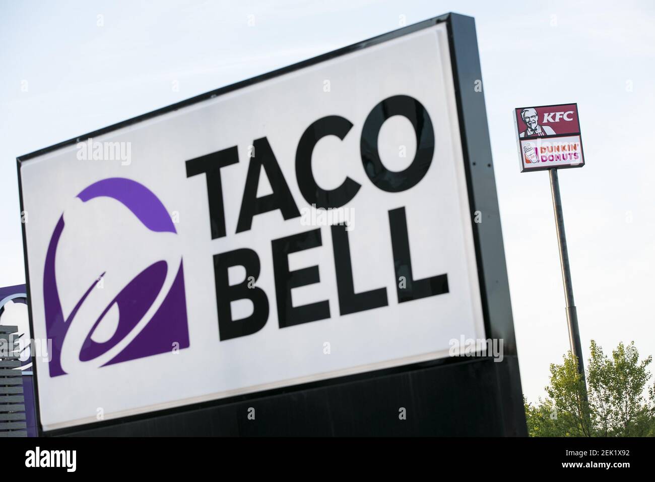 Taco Bell, Kentucky Fried Chicken (KFC) and Dunkin' Donuts logo signs