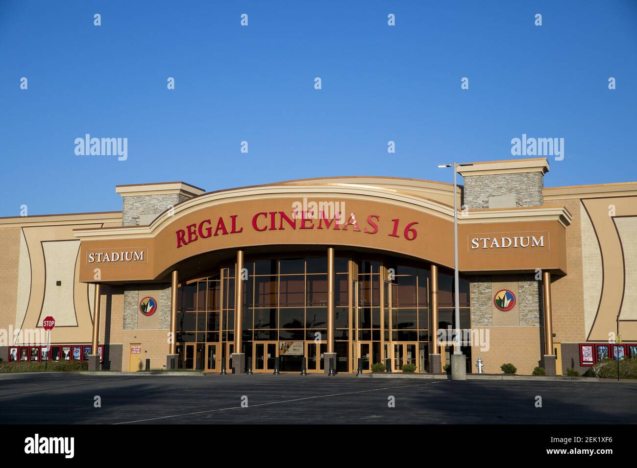 A logo sign outside of a Regal Cinemas movie theater location in