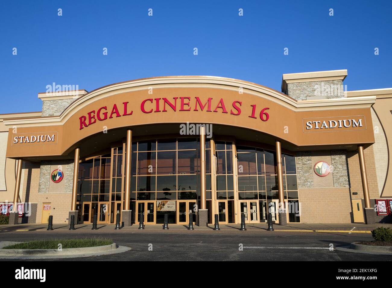 A logo sign outside of a Regal Cinemas movie theater location in