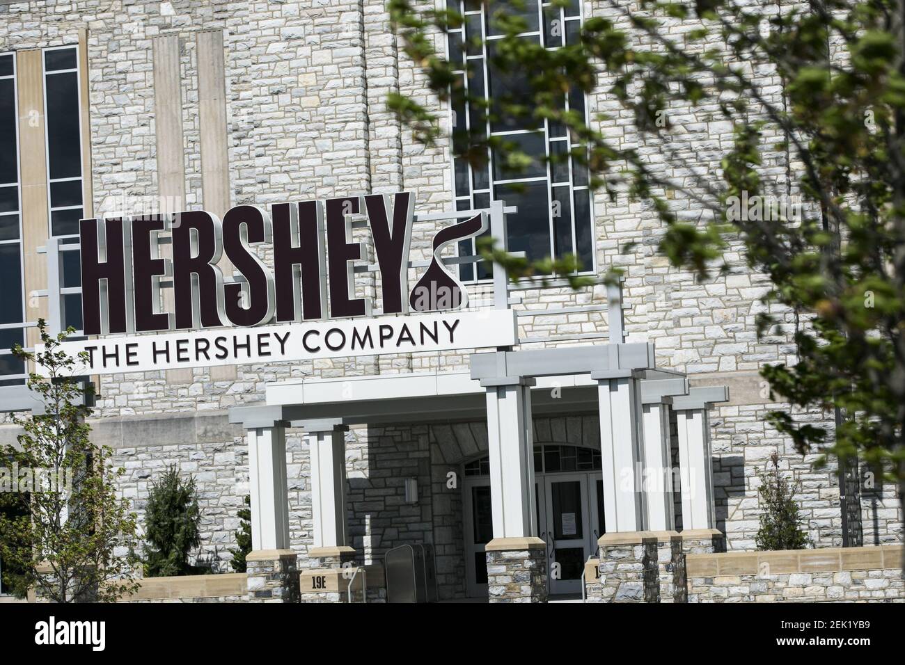 A logo sign outside of the headquarters of The Hershey Company (Hershey
