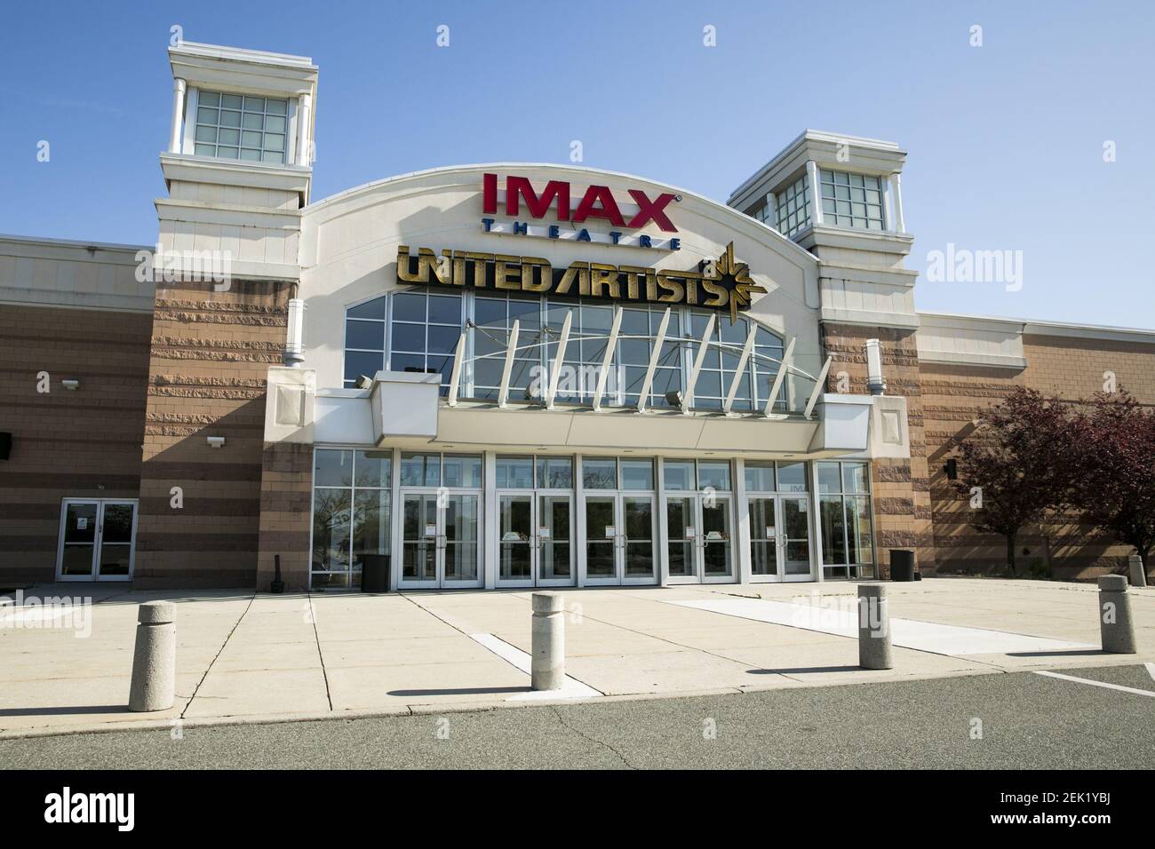 A logo sign outside of a United Artists movie theater location in King