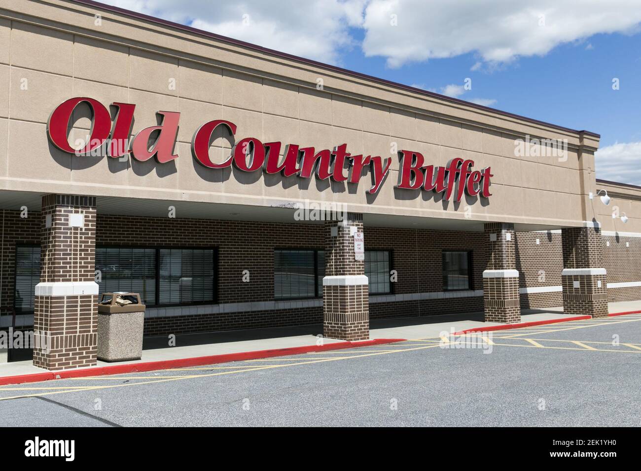 A logo sign outside of a Old Country Buffet restaurant location in ...