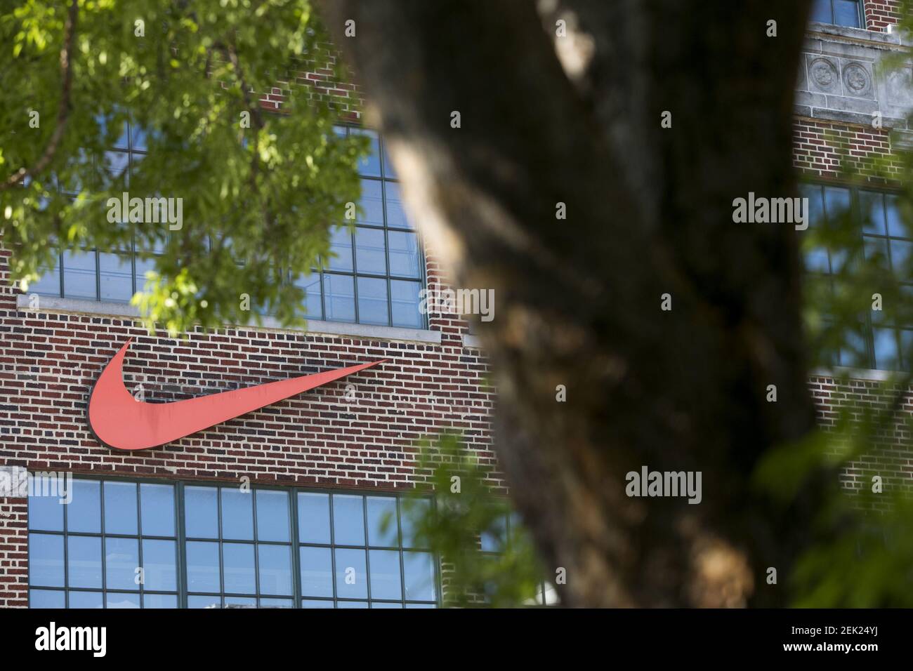 A logo sign outside of a Nike retail store location in Washington, D.C., on  May 9, 2020. (Photo by Kristoffer Tripplaar/Sipa USA Stock Photo - Alamy