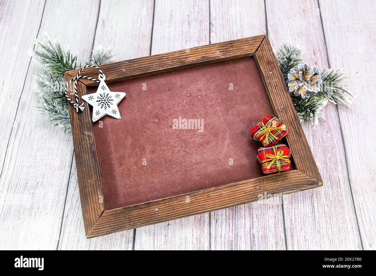 Happy New Year. School board, spruce branches and holiday decorations