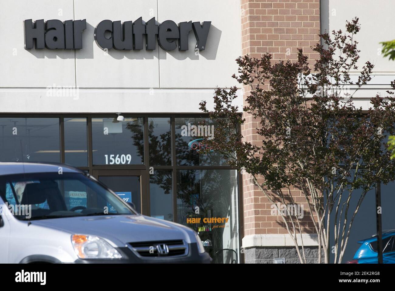 A logo sign outside of a Hair Cuttery location in Midlothian, Virginia