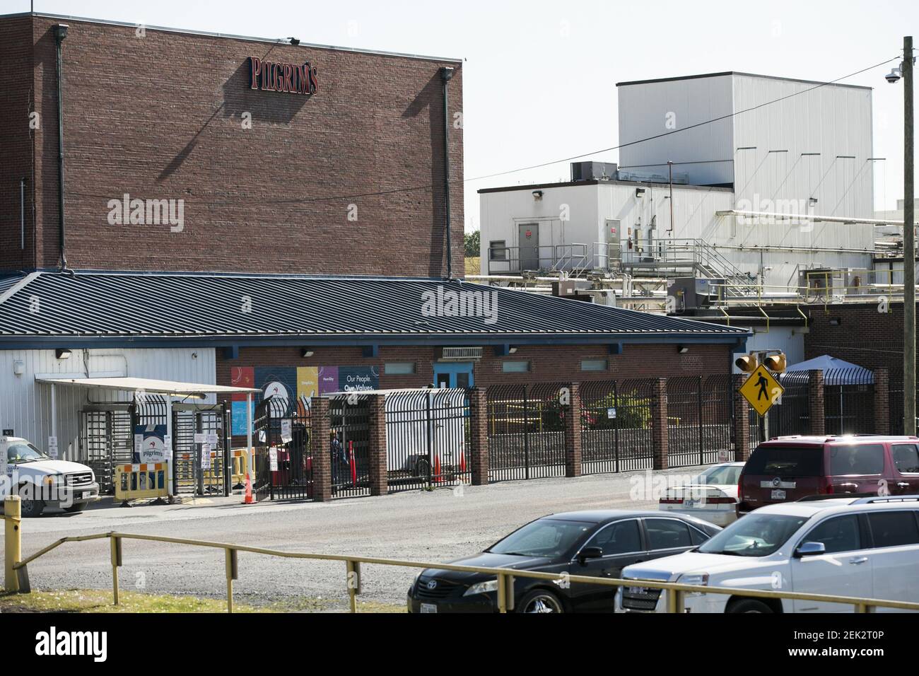 A logo sign outside of a Pilgrim's Pride poultry processing plant in