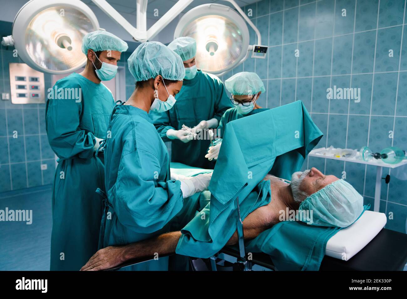 Group of surgeon team at work in operating room in hospital Stock Photo ...