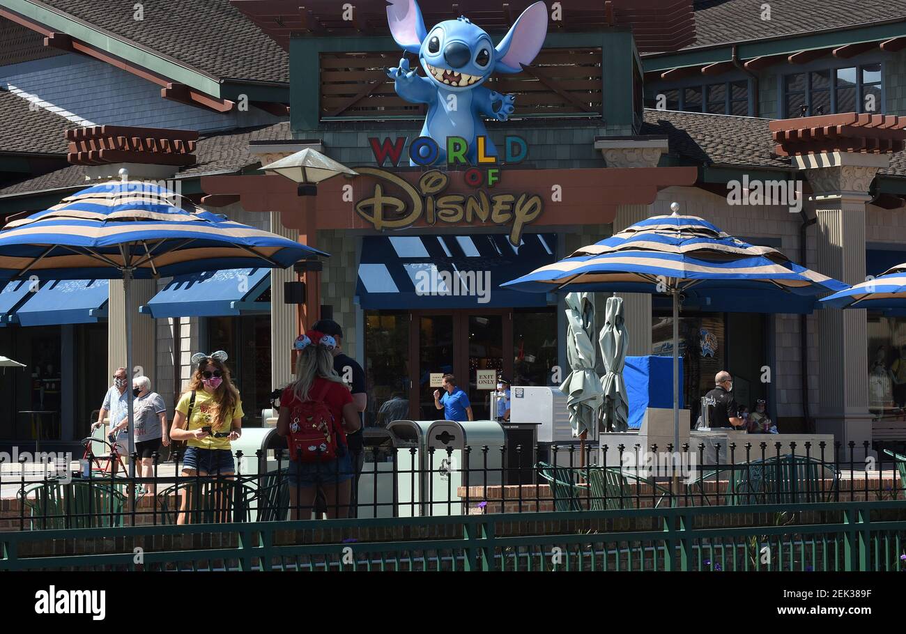 People visit Disney Springs at Walt Disney World on the day the retail