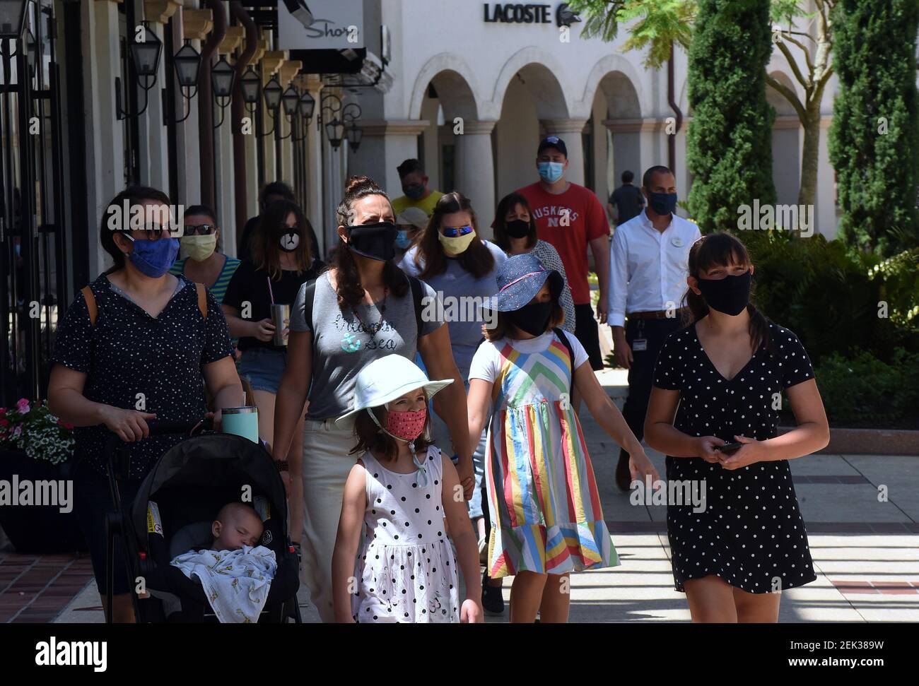 People visit Disney Springs at Walt Disney World on the day the retail