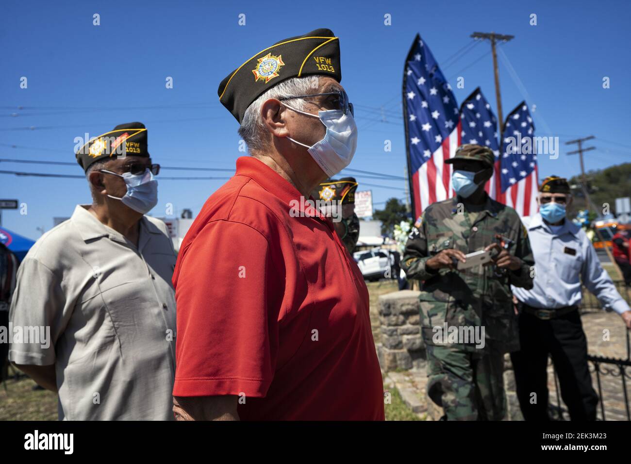 Veterans wearing face masks due to the COVID 19 pandemic participate in a Memorial Day ceremony in Los Angeles, California on May 25, 2020. The event took place at the Los Cinco Puntos/Five Points Memorial that honors Mexican American soldiers who died in World War II, the Korean War, and the Vietnam War. (Photo by Ronen Tivony/Sipa USA) *** Please Use Credit from Credit Field *** Stock Photo