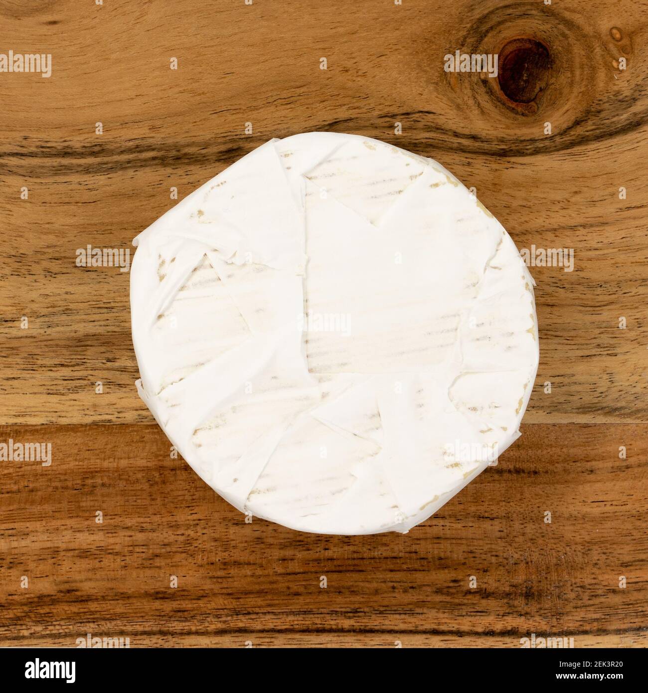 Brie or camambert cheese on wooden a board. Stock Photo