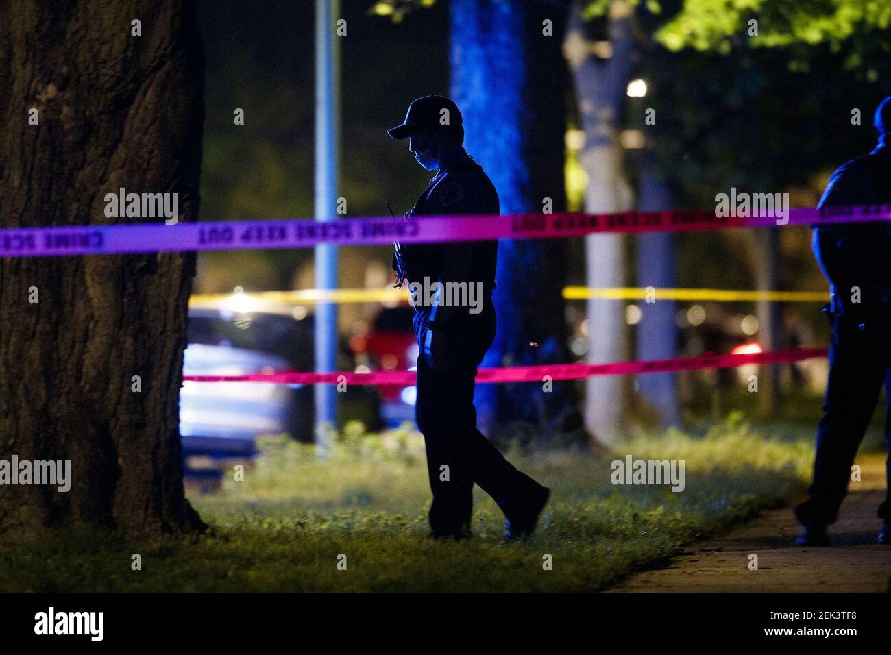 Chicago police work at the scene where a 37-year-old man was fatally shot in the 7500 block South Chappel Avenue in the South Shore neighborhood in Chicago, Ill. on May 26, 2020. (Armando L. Sanchez/Chicago Tribune/TNS) Stock Photo