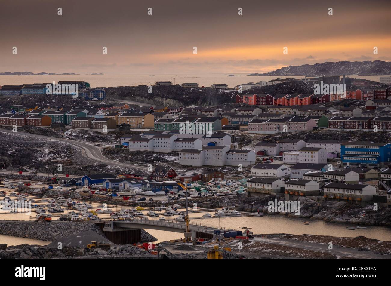 overview onto oa part of the city of Nuuk at sunset, in Greenland Stock Photo
