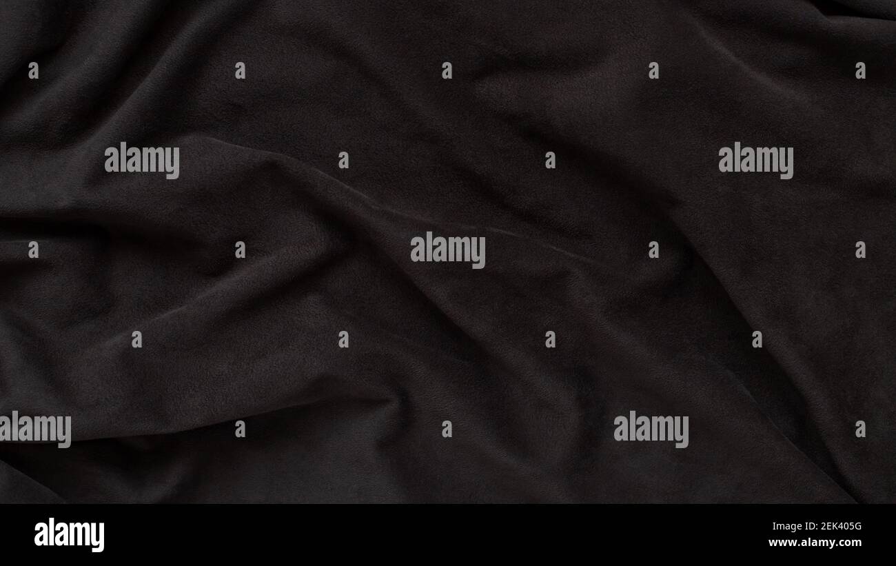 dark brown suede wavy fabric. Texture, background Stock Photo