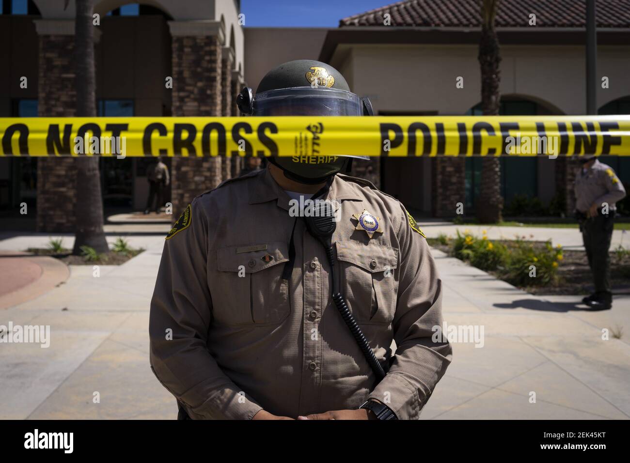 Westmont, Los Angeles An LA Sheriff's Deputy stands behind a police line at Black Lives Matter