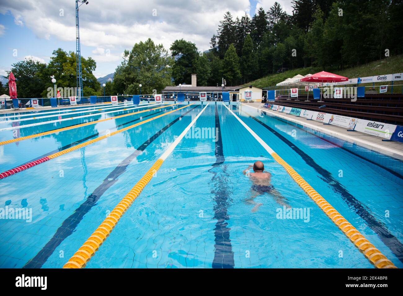 A man seen swimming as water parks reopen. Swimming pools reopened