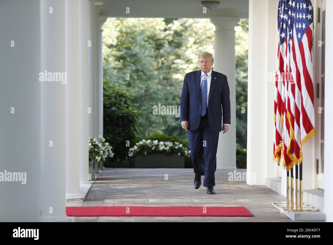 US President Donald J. Trump arrives to deliver remarks in the Rose ...