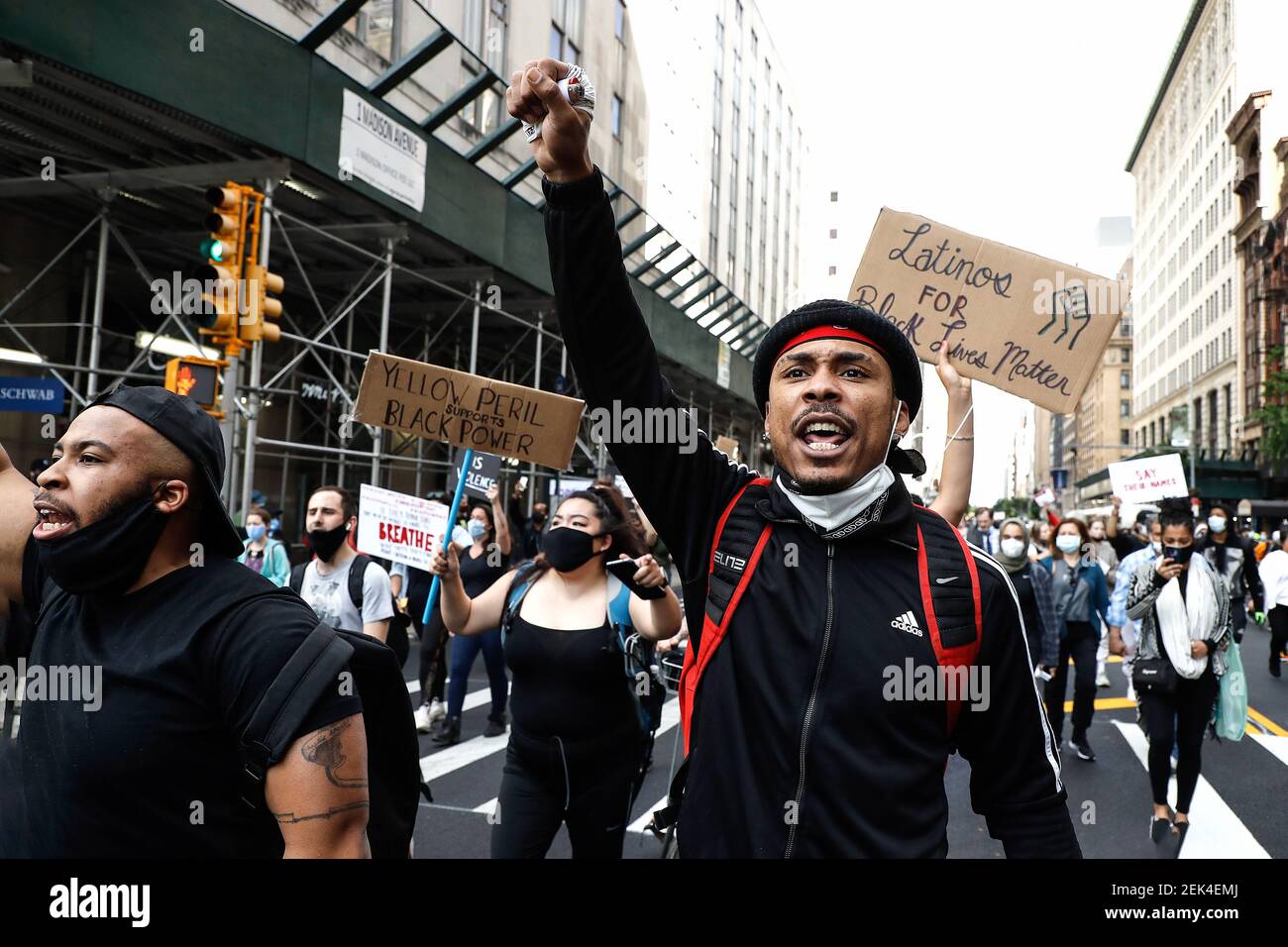 Protesters march on the streets of the city in response to the death of ...