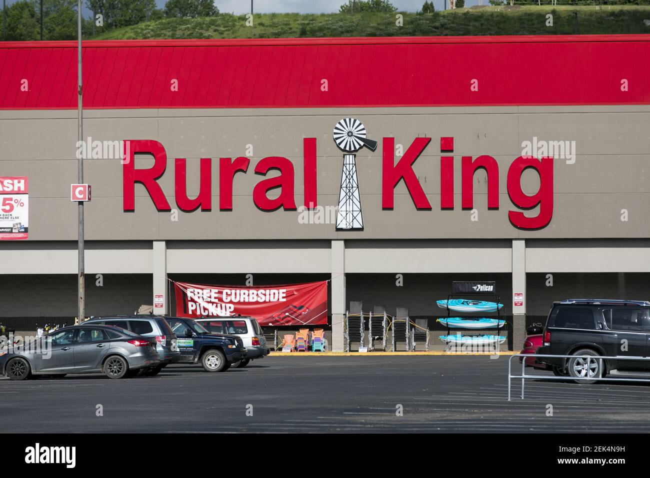 A logo sign outside of a Rural King Supply retail store location in