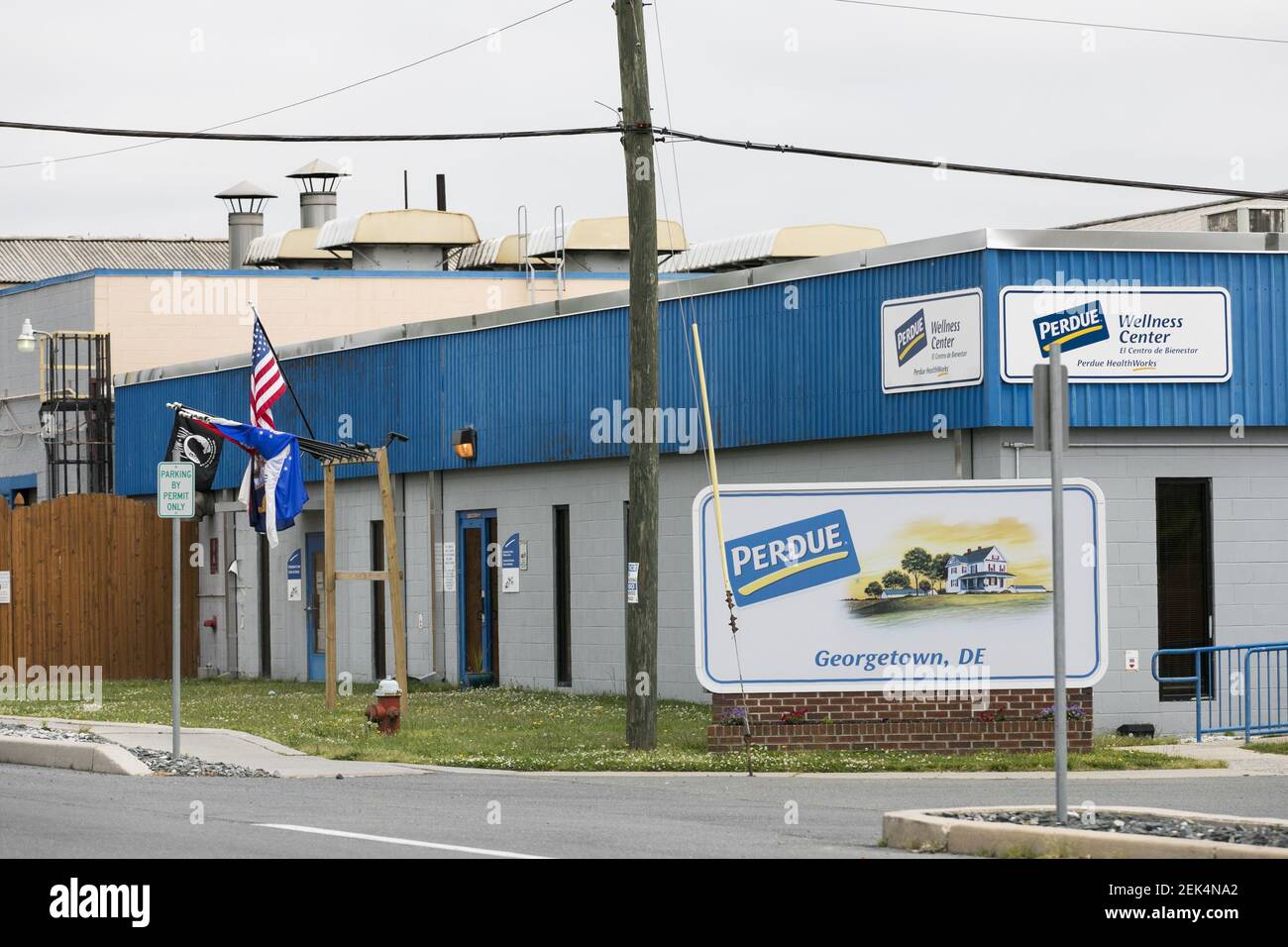 A logo sign outside of a Perdue Farms poultry processing plant in