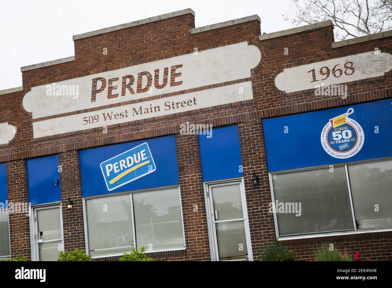 A logo sign outside of a Perdue Farms poultry processing plant in