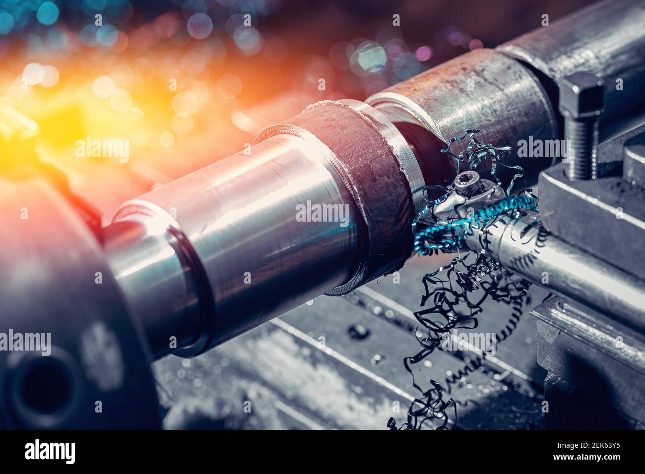 Process CNC lathe machine cutting metal. Modern industrial iron