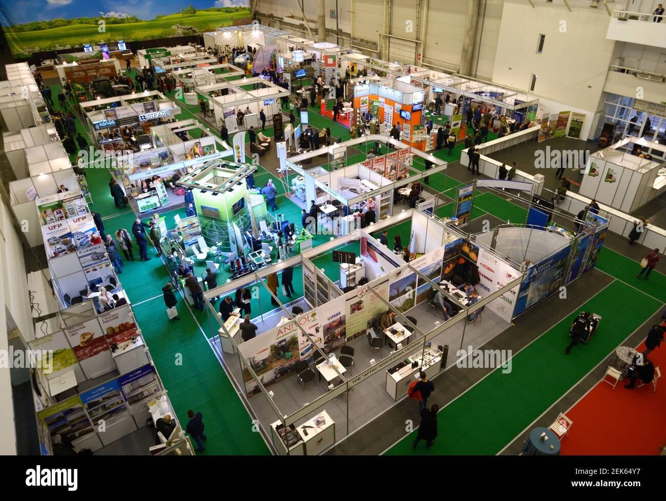 Large hall with stands and people walking, top view. Exhibition AgroTrade-2019. January 11, 2019.Kiev, Ukraine Stock Photo