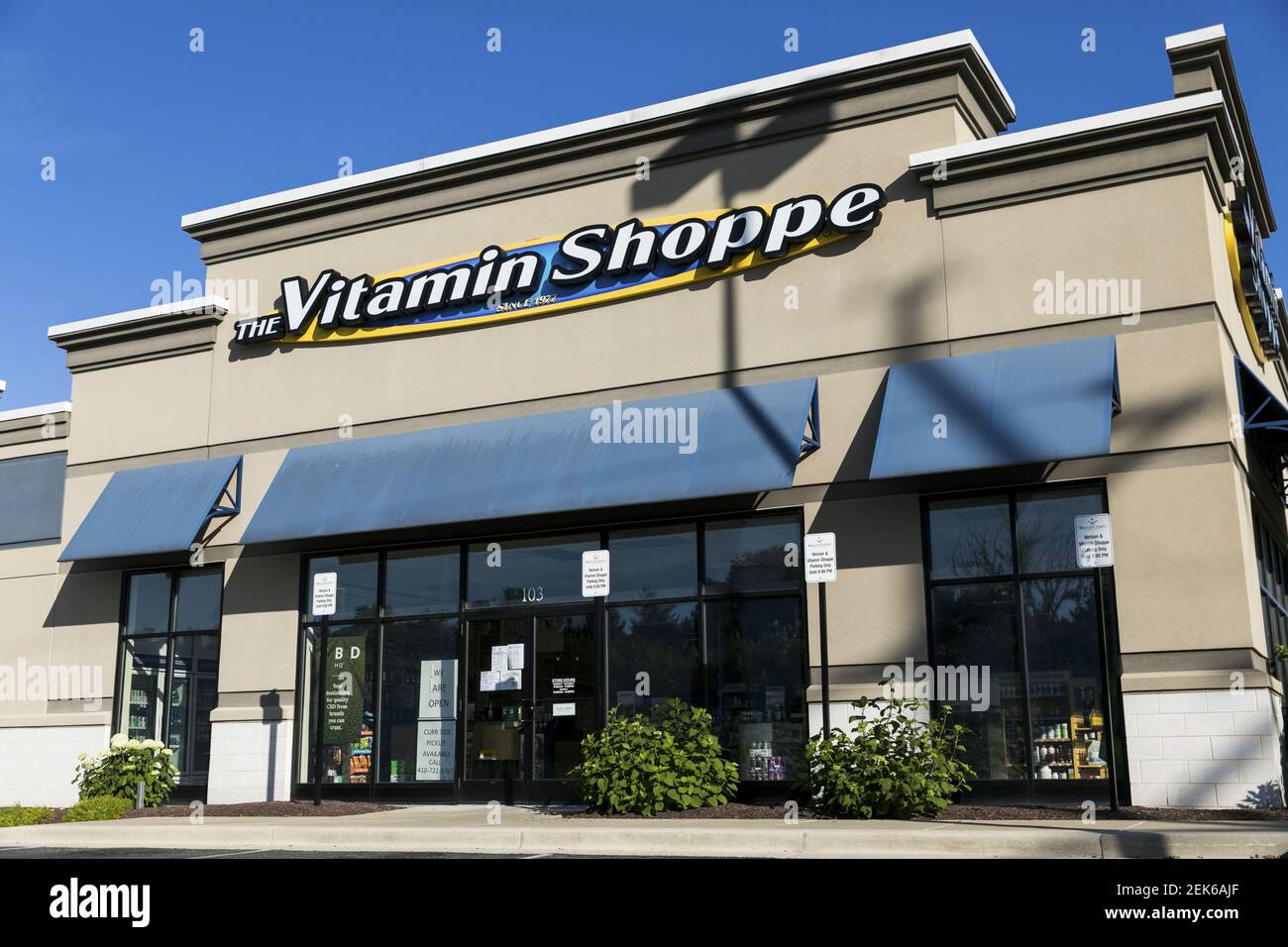 A logo sign outside of a The Vitamin Shoppe retail store location in Gambrills, Maryland on June