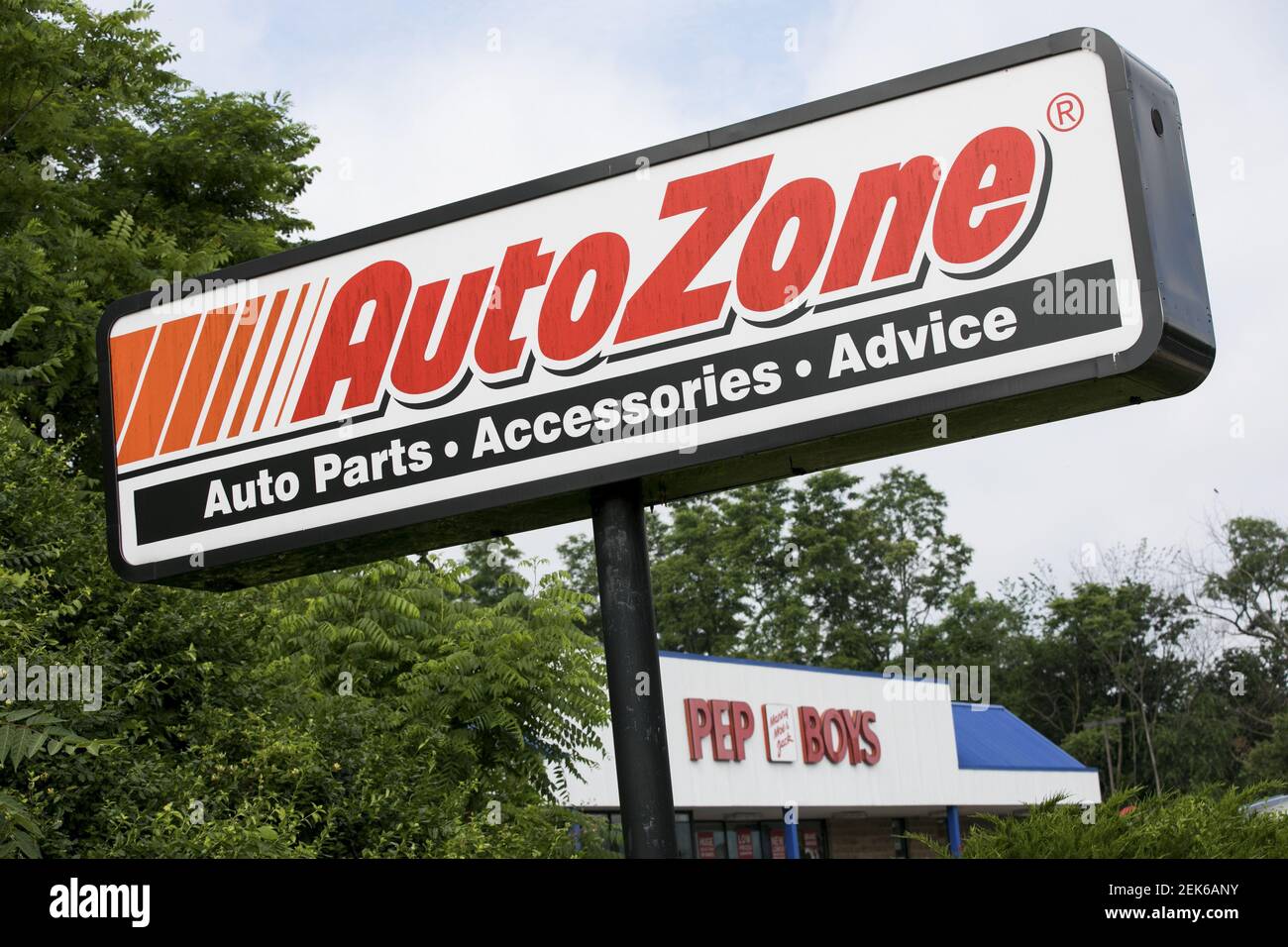 Logo signs outside of AutoZone and Pep Boys retail store locations in