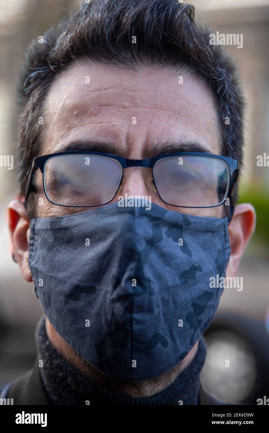 Man Wearing Mask with Steamed up Glasses Stock Photo