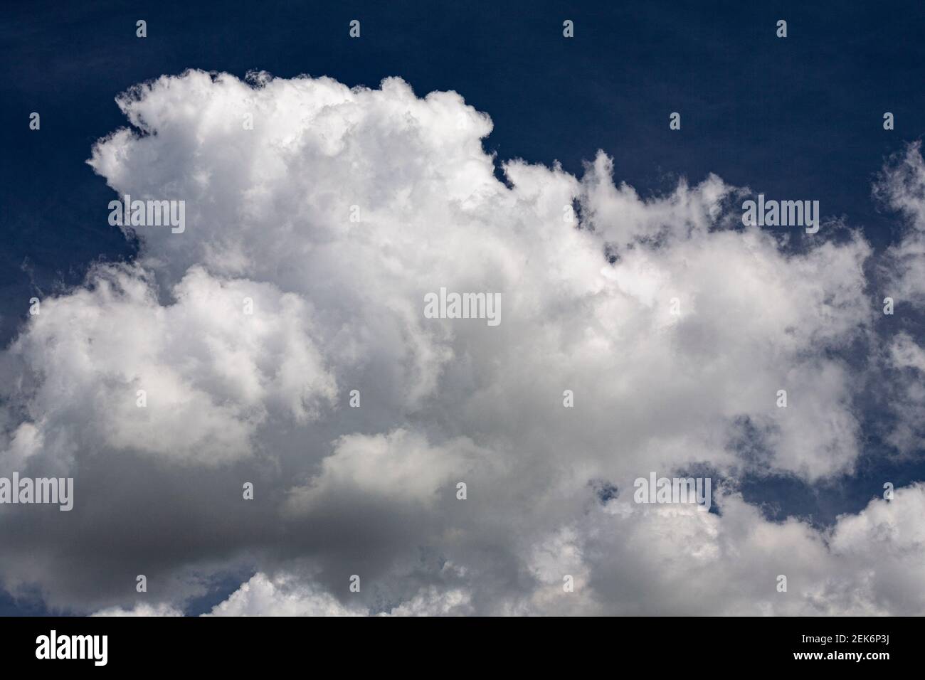 Cumulonimbus cloud in a blue sky Stock Photo