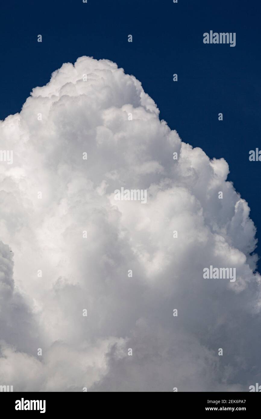 Cumulonimbus cloud in a blue sky Stock Photo