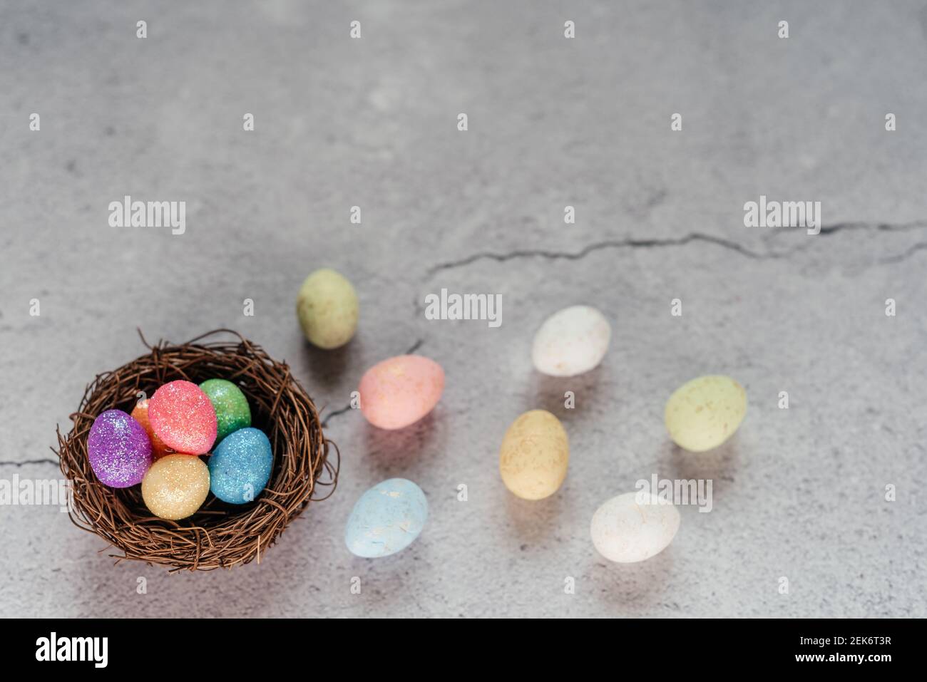 Colourful Easter eggs on gray cement background Stock Photo