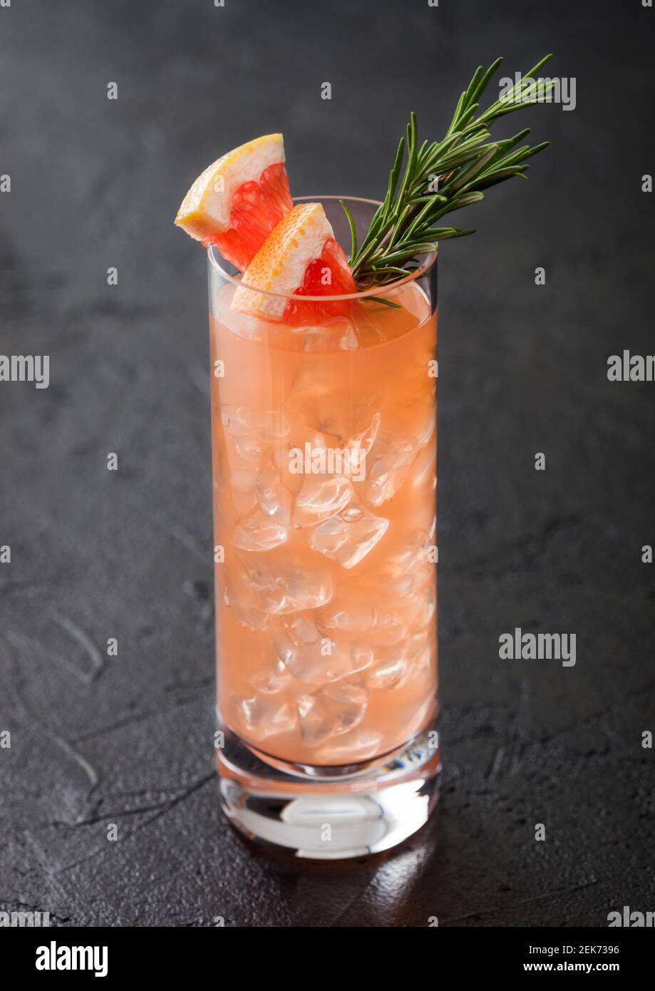 Highball glass of cocktail with red grapefruit and gin with vodka with