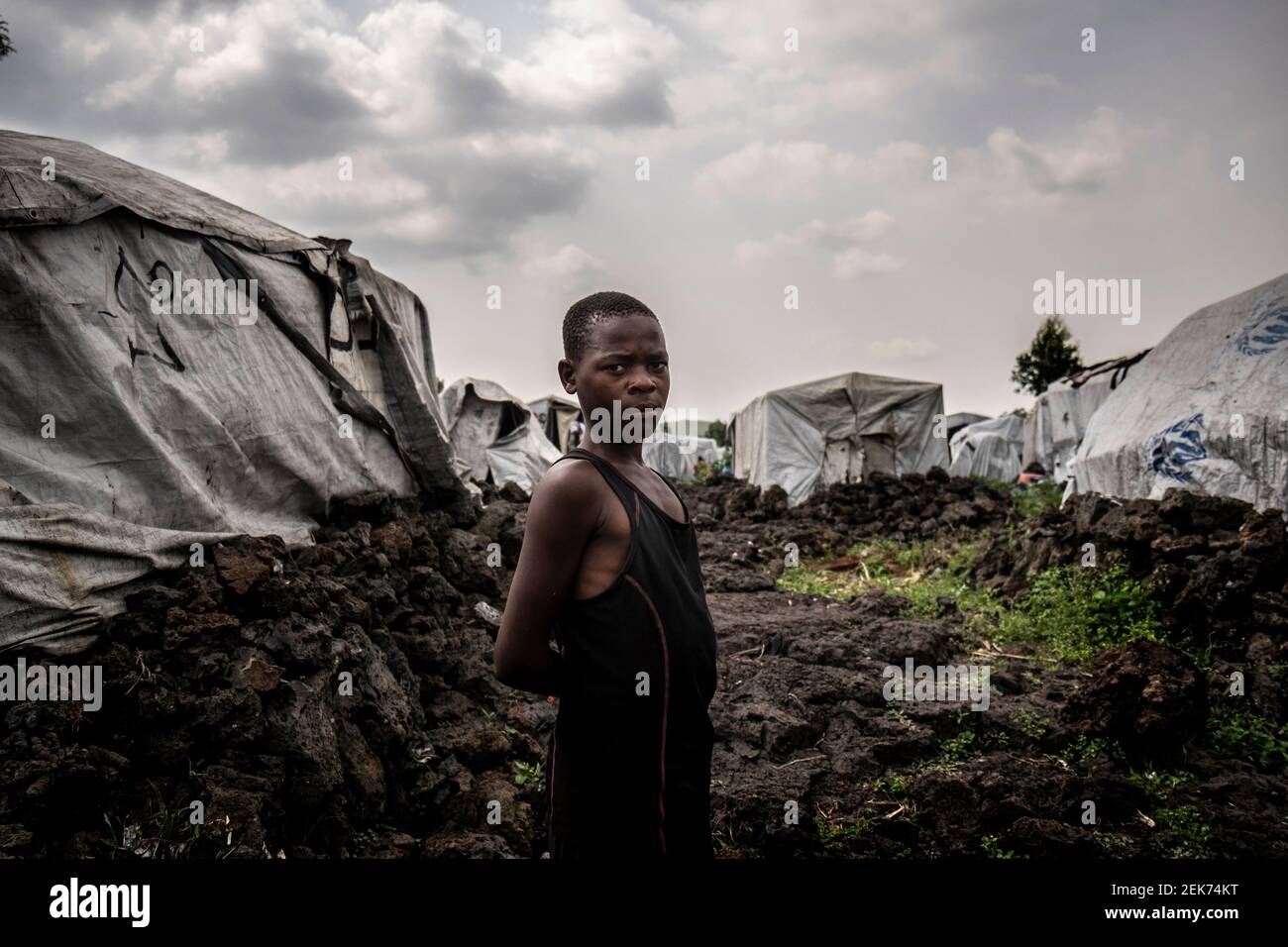 A young refugee from Rwanda in the Refugees Camp outside Goma Stock Photo