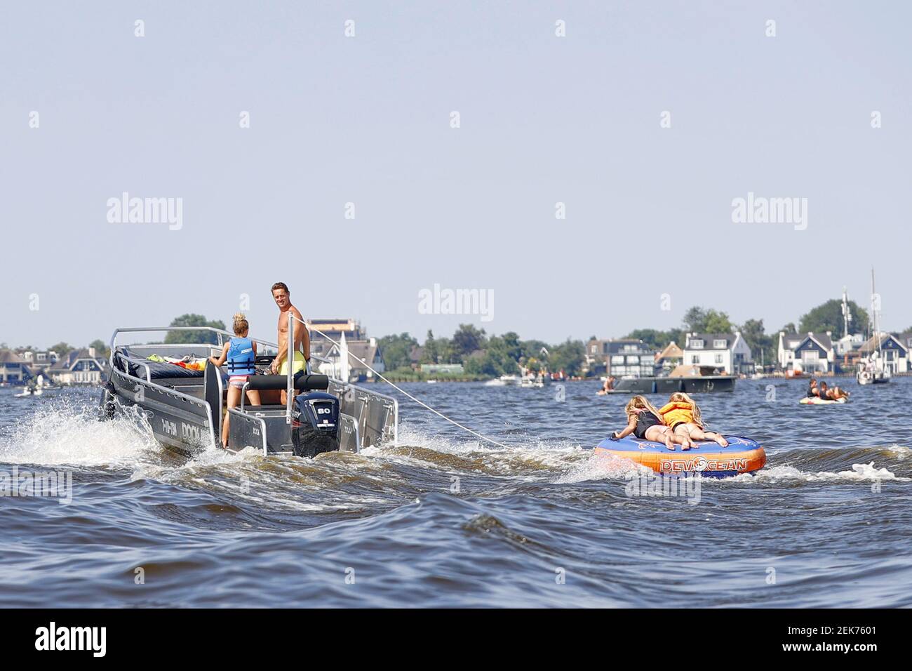 LOOSDRECHT, 26-06-2020 , Summertime on the lakes of Holland where temperatures reached 30 degrees Celsius. Many people enjoy their freedom after a long period of lockdown due to the coronacrisis. De Loosdrechtse plassen tijdens een warme zomerdag. Vlinder achter de boot (Photo by Pro Shots/Sipa USA) Stock Photo