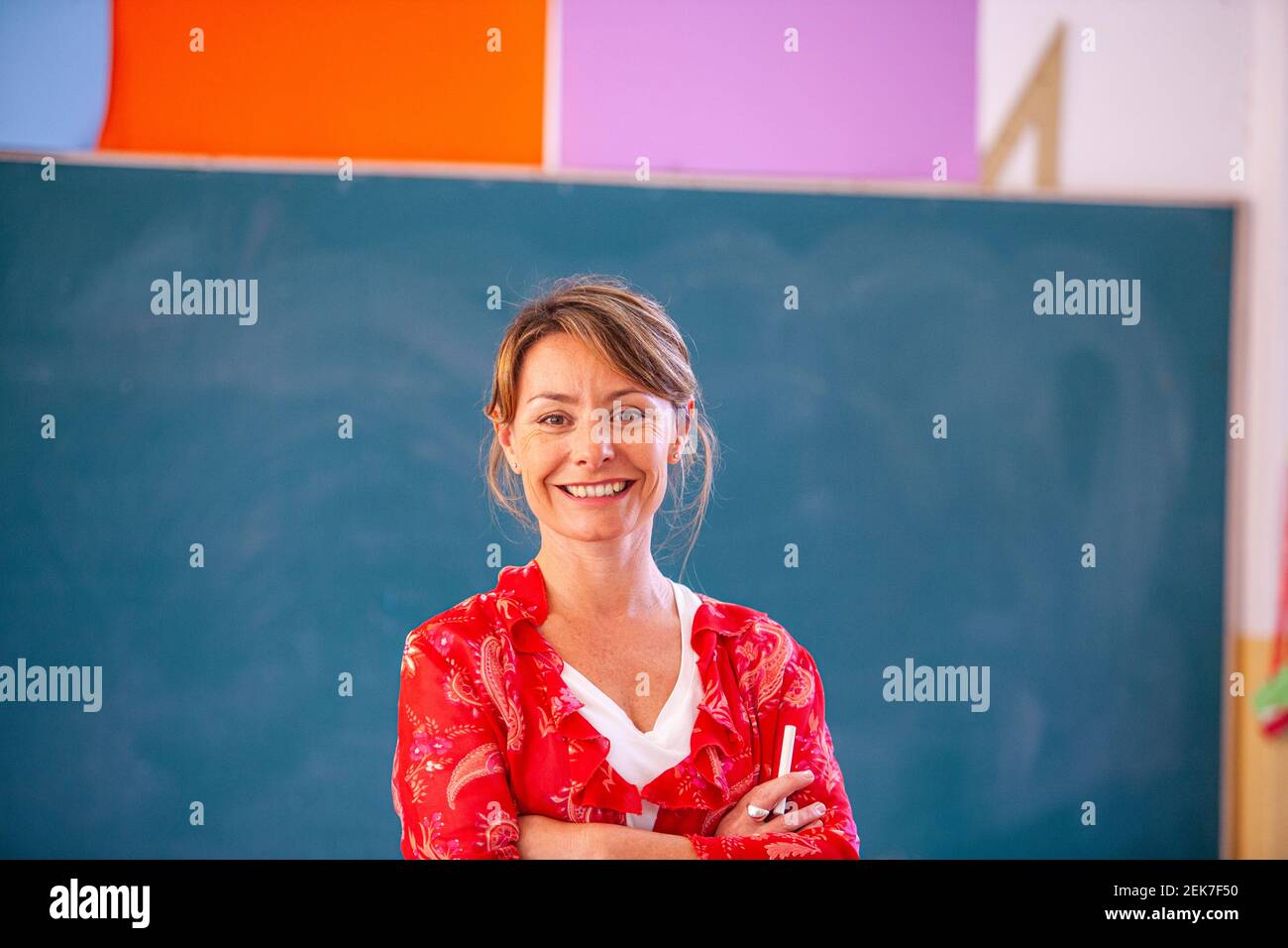 Primary school teacher in a classroom Stock Photo Alamy