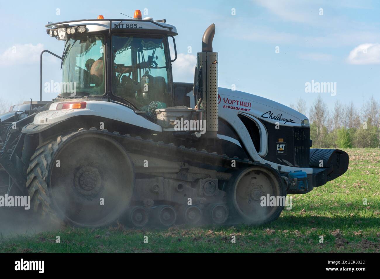 Dolyna, Ukraine April 29, 2020: agro-industrial machinery will cultivate the fields, a tractor of a challender company on caterpillars, an agricultura Stock Photo