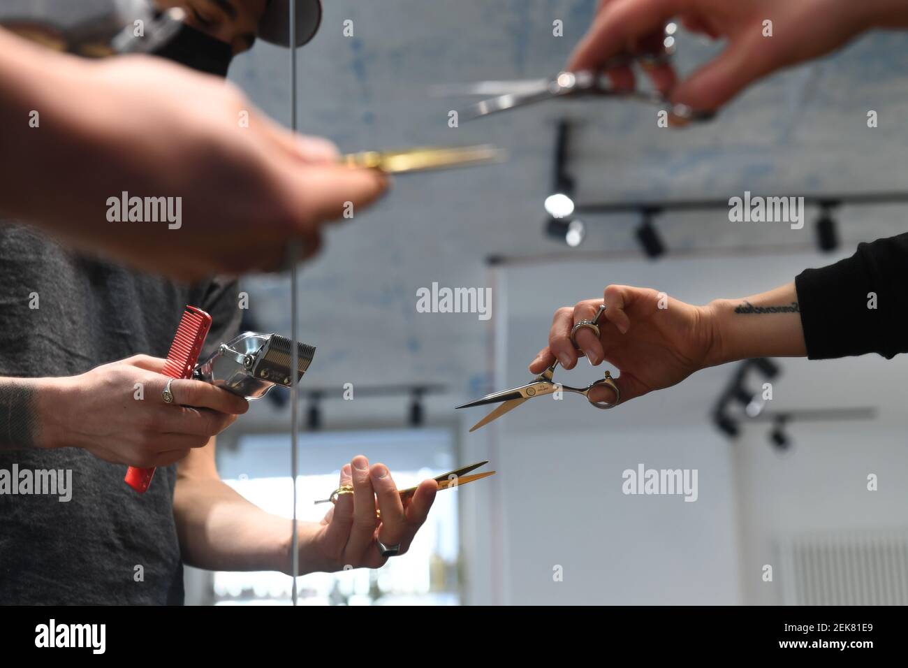 Munich, Germany. 21st Feb, 2021. Haircutting scissors are on display at