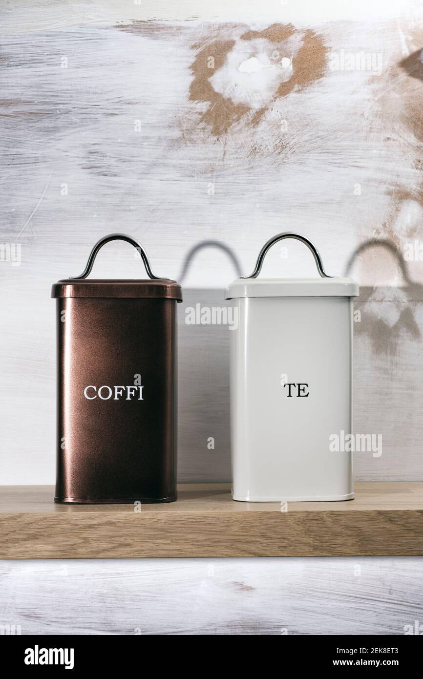 Welsh Te and Coffi tins on a wooden shelf. Stock Photo