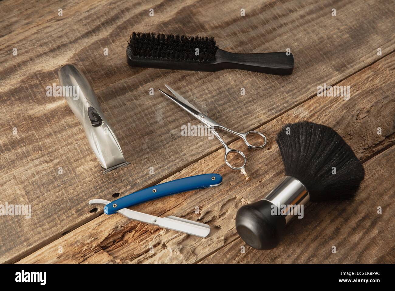 Barber shop equipment set isolated on wooden table background. Close up ...