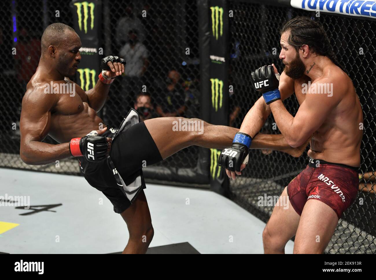 July 12 Abu Dhabi Uae Kamaru Usman Of Nigeria Kicks Jorge Masvidal In Their Ufc Welterweight Championship Fight During The Ufc 251 Event At Flash Forum On Ufc Fight Island On