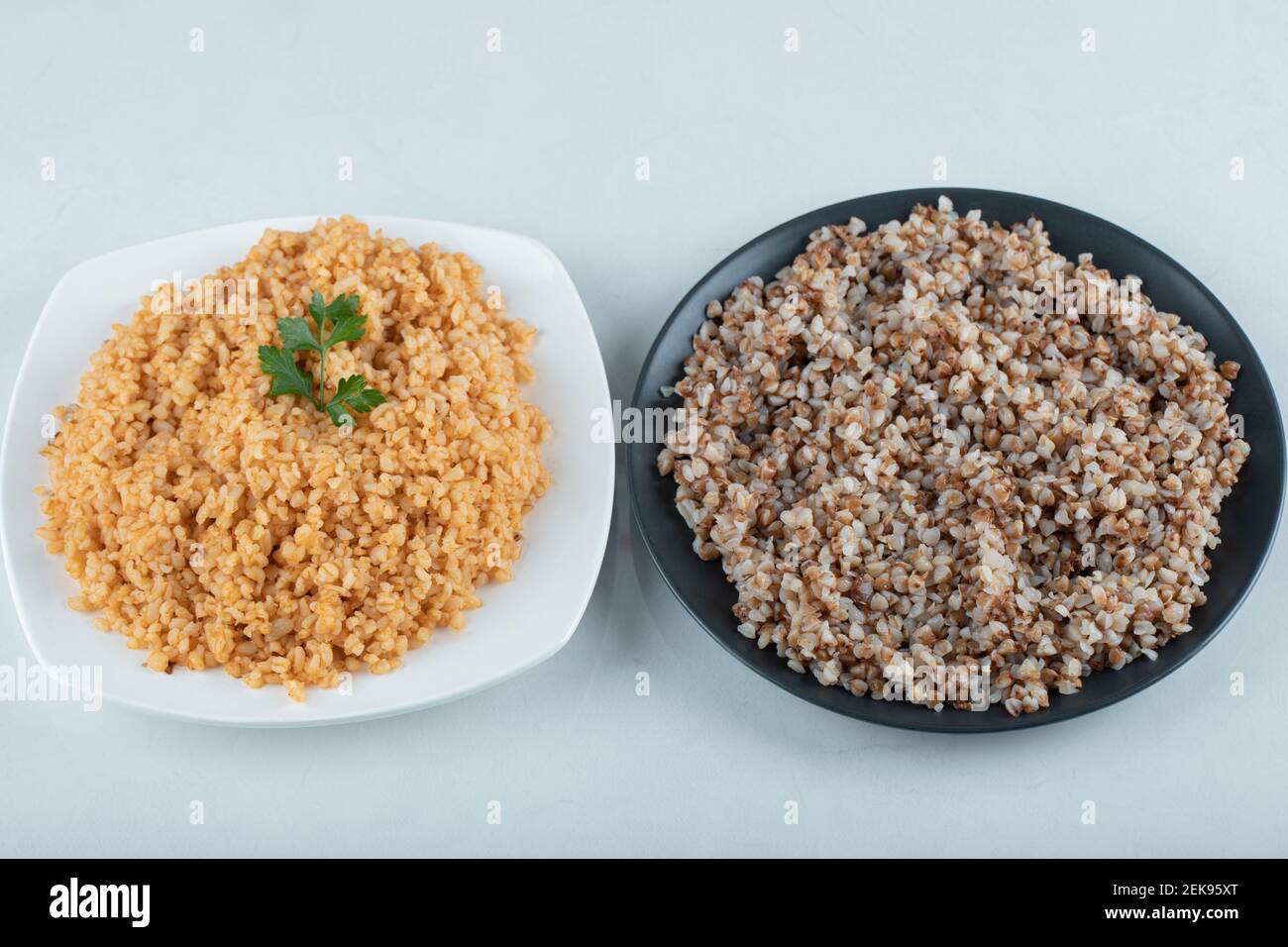 Bulgerty Eatable Delicious bulgur and buckwheat on a plates Stock Photo - Alamy