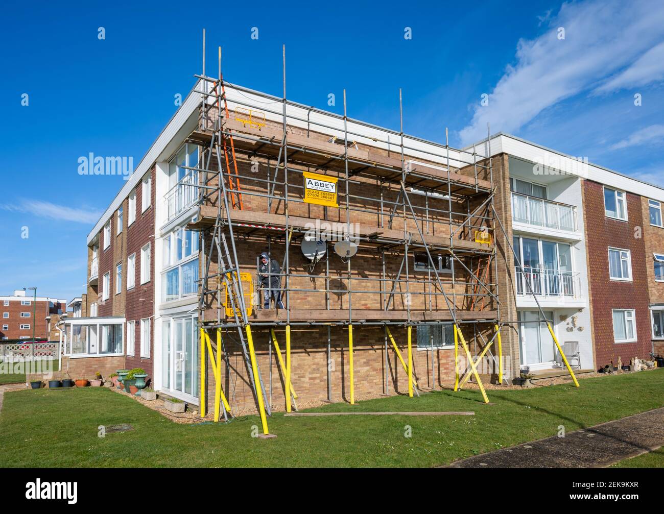 Scaffolding covering flats or apartments as they undergo repairs at